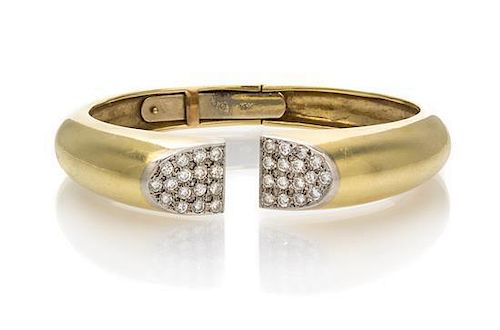 A 14 Karat Yellow Gold and Diamond Cuff Bracelet, 27.60 dwts.
