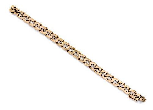 * A 14 Karat Yellow Gold Fancy Curb Link Bracelet, Tiffany & Co., 32.40 dwts.
