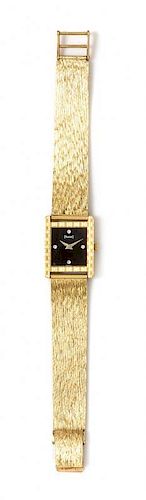 An 18 Karat Yellow Gold and Diamond Wristwatch, Piaget, 34.70 dwts.