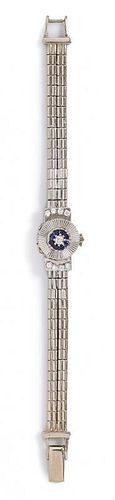 A 14 White Gold, Diamond and Sapphire Surprise Wristwatch, Jean Sybe, 19.30 dwts.