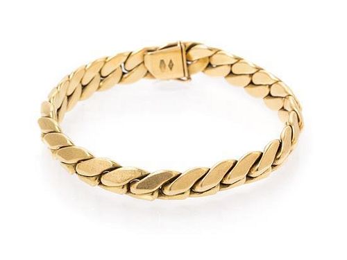 An 18 Karat Yellow Gold Angular Curb Link Chain Bracelet, 17.70 dwts.