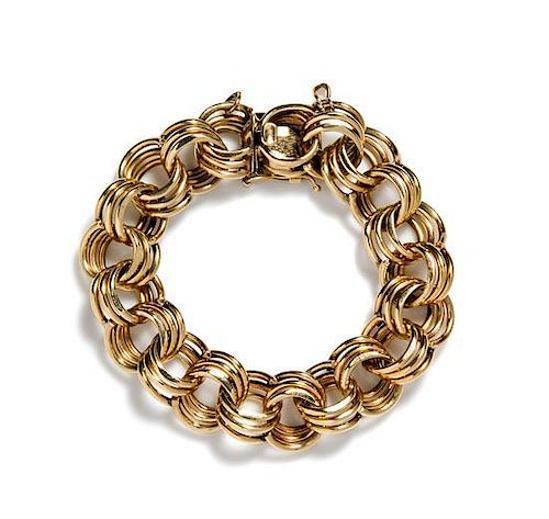 A 14 Karat Yellow Gold Triple Link Chain Bracelet, 45.70 dwts.
