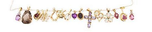 A Collection of Yellow Gold and Multi Gem Charms, 15.60 dwts.