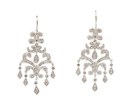 * A Pair of 14 Karat White Gold and Diamond Chandalier Earrings, 4.90 dwts.