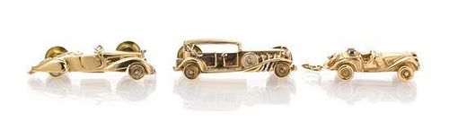 A Collection of Yellow Gold and Multi Gem Vintage Car Motif Jewelry, 17.60 dwts.