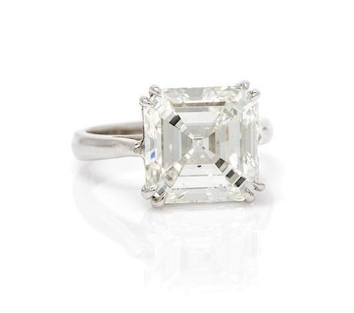 * A Platinum and Diamond Solitaire Ring,