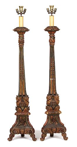 A Pair of Italian Baroque Style Painted and Parcel Gilt Torcheres Height 76 3/4 inches.