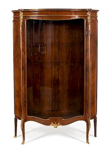 A Louis XV Style Gilt Bronze Mounted Kingwood Serpentine Vitrine Cabinet Height 70 x width 47 x depth 14 inches.