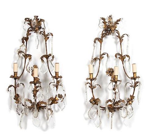 A Pair of Louis XV Style Gilt Metal and Crystal Three-Light Wall Sconces Height 32 inches.