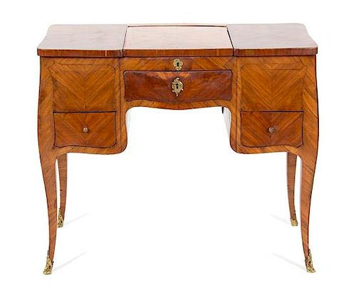 A Louis XV Provincial Style Inlaid Walnut Dressing Table Height 29 1/2 x width 35 1/2 x depth 20 inches.