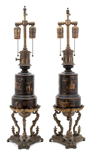 A Pair of French Gilt Bronze and Tole Fluid Lamps Height overall 27 x diameter 7 1/2 inches.