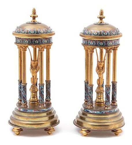 A Pair of French Champleve Enamel and Gilt Bronze Stands with Interior Sphinx Height 11 x diameter 4 1/2 inches.