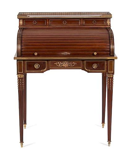 A Louis XVI Style Gilt Bronze Mounted Mahogany Bureau a Cylindre Height 40 1/2 x width 30 1/2 x depth 21 1/4 inches.
