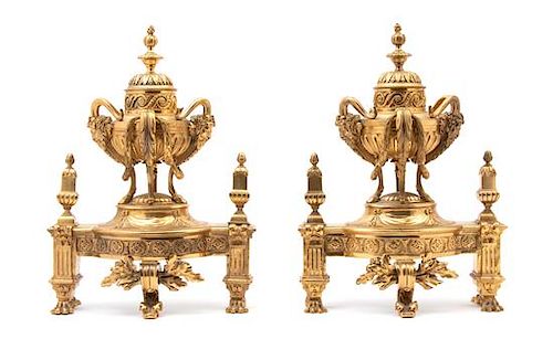 A Pair of Louis XVI Style Gilt Bronze Urn-form Chenets Heigh 17 x width 12 inches.