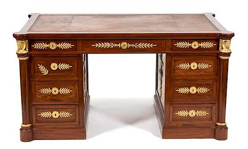 An French Empire Style Gilt Bronze Mounted Mahogany Pedestal Desk Height 28 x width 56 x depth 32 inches.