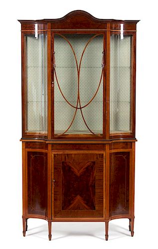 A Hepplewhite Style Satinwood Inlaid Mahogany Breakfront Height 78 1/2 x width 42 1/2 x depth 15 3/4 inches.