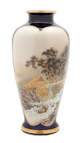 A Japanese Satsuma Porcelain Vase Height 9 1/2 x diameter 4 1/4 inches.