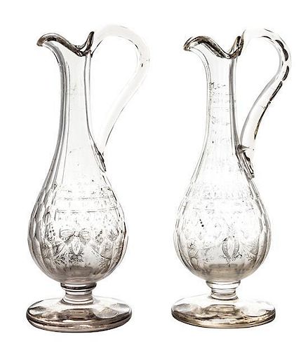 A Pair of French Gilt Decorated Cut Glass Wine Ewers Height 14 1/2 inches.