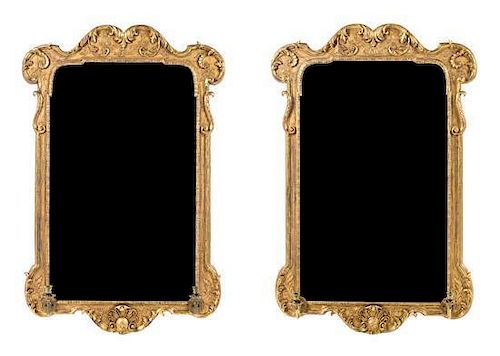 A Pair of George II Giltwood Girandole Mirrors Height 56 x width 36 1/2 inches.