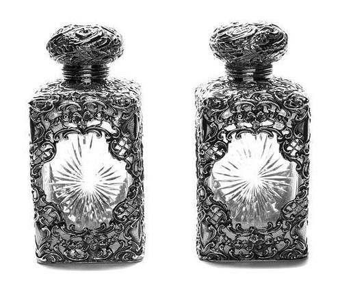 A Pair of English Silver Mounted Glass Bottles Height 5 3/4 inches.
