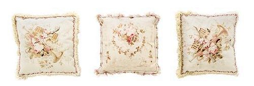 A Set of Three Aubusson Upholstered Pillows Width of widest 8 inches.