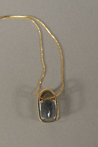 14 karat gold chain with pendant set with large aquamarine. 11.6 x 14.5mm