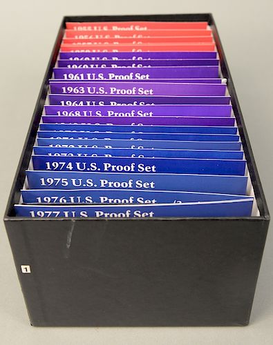 U.S. proof sets in black box (1954-1977).