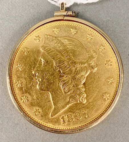1897 S. double eagle in gold ring.
36.1 grams total weight