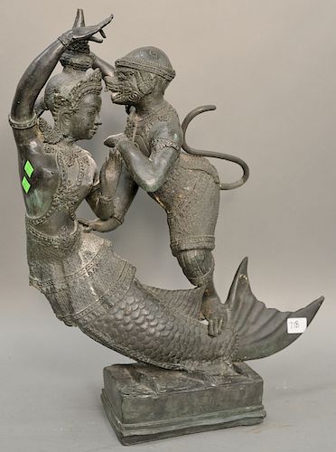 Figural Tibetan bronze depicting standing monkey and a finned woman, ht. 25 1/2 in.