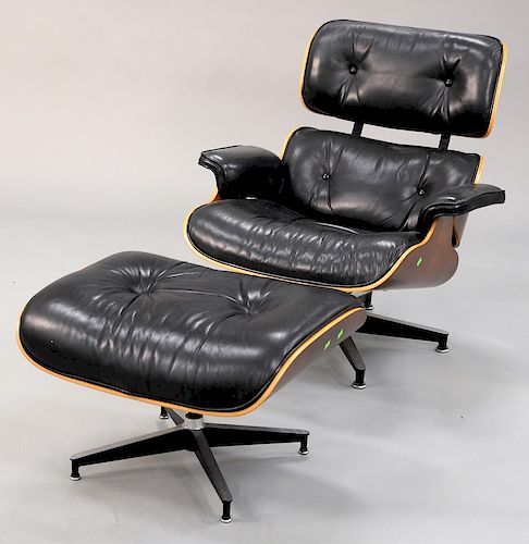 Herman Miller leather lounge chair and ottoman, signed.