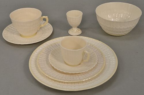 Eighty-one piece Irish Belleek group to include tea pot, coffee pot, pitchers, various bowls, plates, cups, etc.