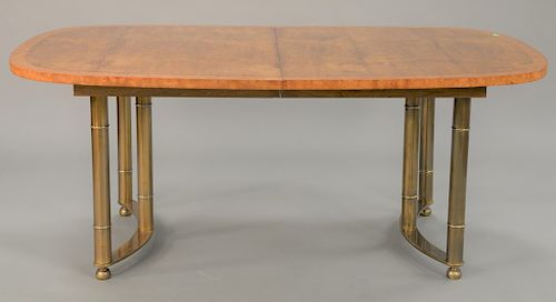 Harvey Probber burl top table with banded inlay, brass legs, and two 20 inch leaves. ht. 29 1/2 in., top: 45" x 72", opens to 112 in.