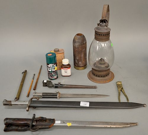 Group lot with four bayonets, scale, lead ball mold with lantern (ht. 15 in.).