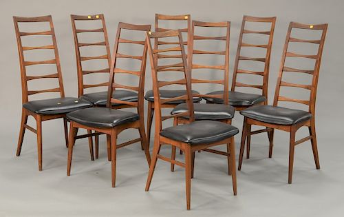 Set of eight Niels Kofod Larsen rosewood bow tie back dining chairs. ht. 42 in.