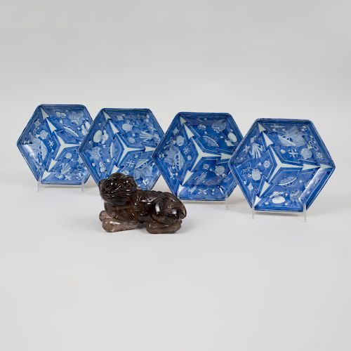 Group of Four Chinese Hexagonal Blue and White Porcelain Plates and a Smokey Quartz Figure of a Buddhistic Lion 