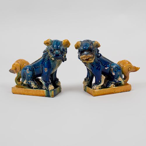 Pair of Chinese Sancai Glazed Pottery Figures of Buddhistic Lions