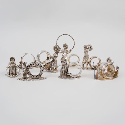 Group of Twenty-One Figural Silver Plate Napkin Rings
