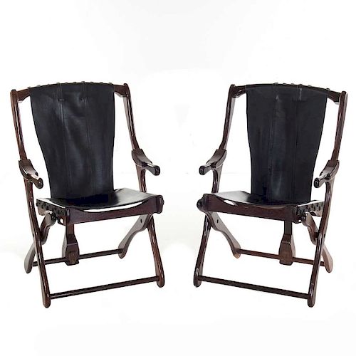 Don S. Shoemaker. México, años 70. Par de sillones "Sling" Estructuras de madera tropical. Con respaldo y asientos de piel. Piezas: 2
