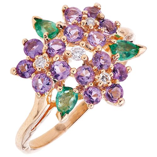 An amethyst, emerald and diamond 14K yellow gold ring.