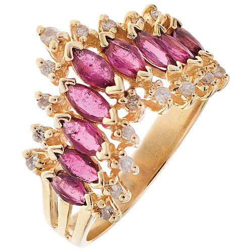 A ruby and diamond 14K yellow gold ring.