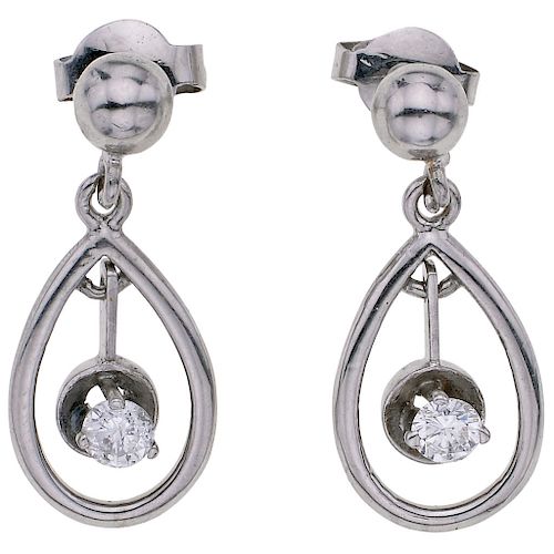 A diamond 14K white gold pair of earrings.