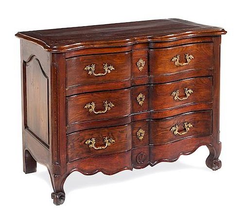 A Louis XV Oak Commode Height 34 x width 42 1/2 x depth 20 inches.