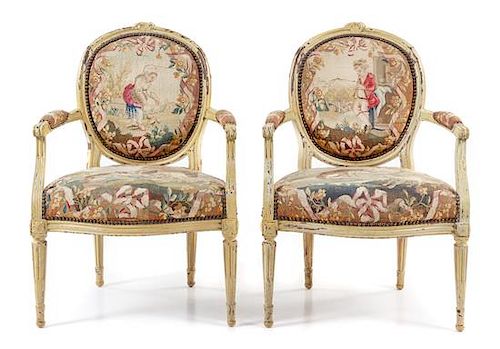 * A Pair of Louis XVI Painted Fauteuils Height 36 1/2 inches.