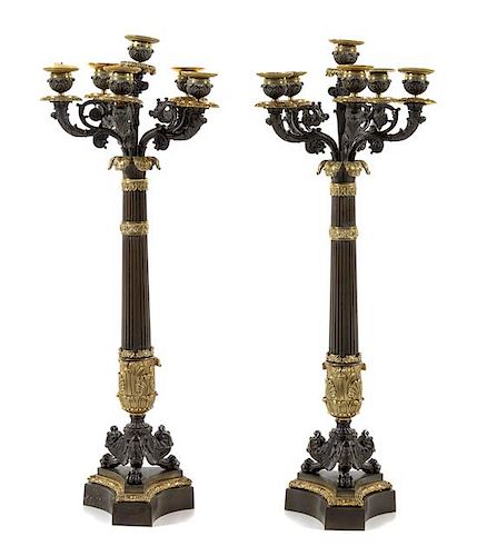 A Pair of Charles X Gilt and Patinated Bronze Six-Light Candelabra Height 28 1/3 inches.