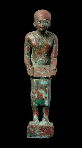 * An Egyptian Bronze Seated Imhotep Height 5 1/2 inches.