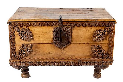 A Spanish Colonial Iron Mounted Trunk Height 31 x width 45 x depth 22 inches.