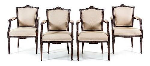 A Set of Four Dutch Mahogany Armchairs Height 37 1/2 inches.
