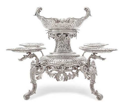 A George II Silver Epergne, Peter Archambo II & Peter Meure, London, 1753, the central basket of oval form with twin-foliate han