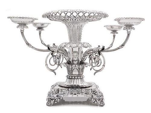 A George III Silver Epergne, Paul Storr, London, 1814, the foliate rim above an openwork basket and acanthus and mask decorated