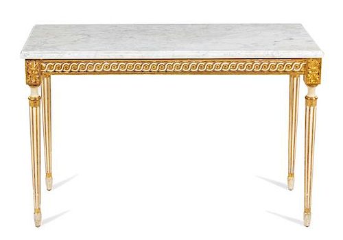 A Louis XVI Style Painted and Parcel Gilt Low Table Height 24 x width 36 x depth 14 inches.